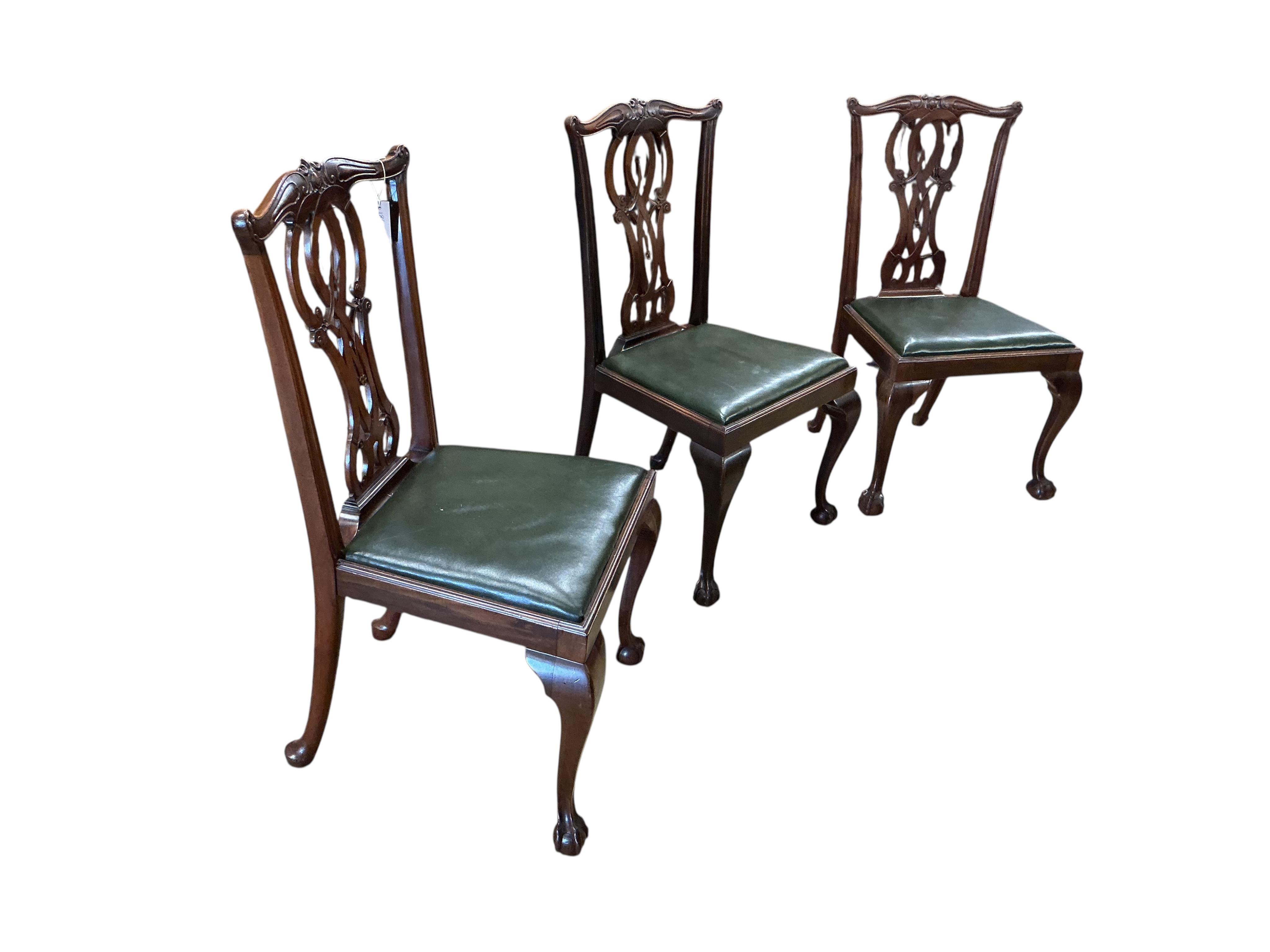 A set of nine Chippendale Revival mahogany dining chairs, two with arms